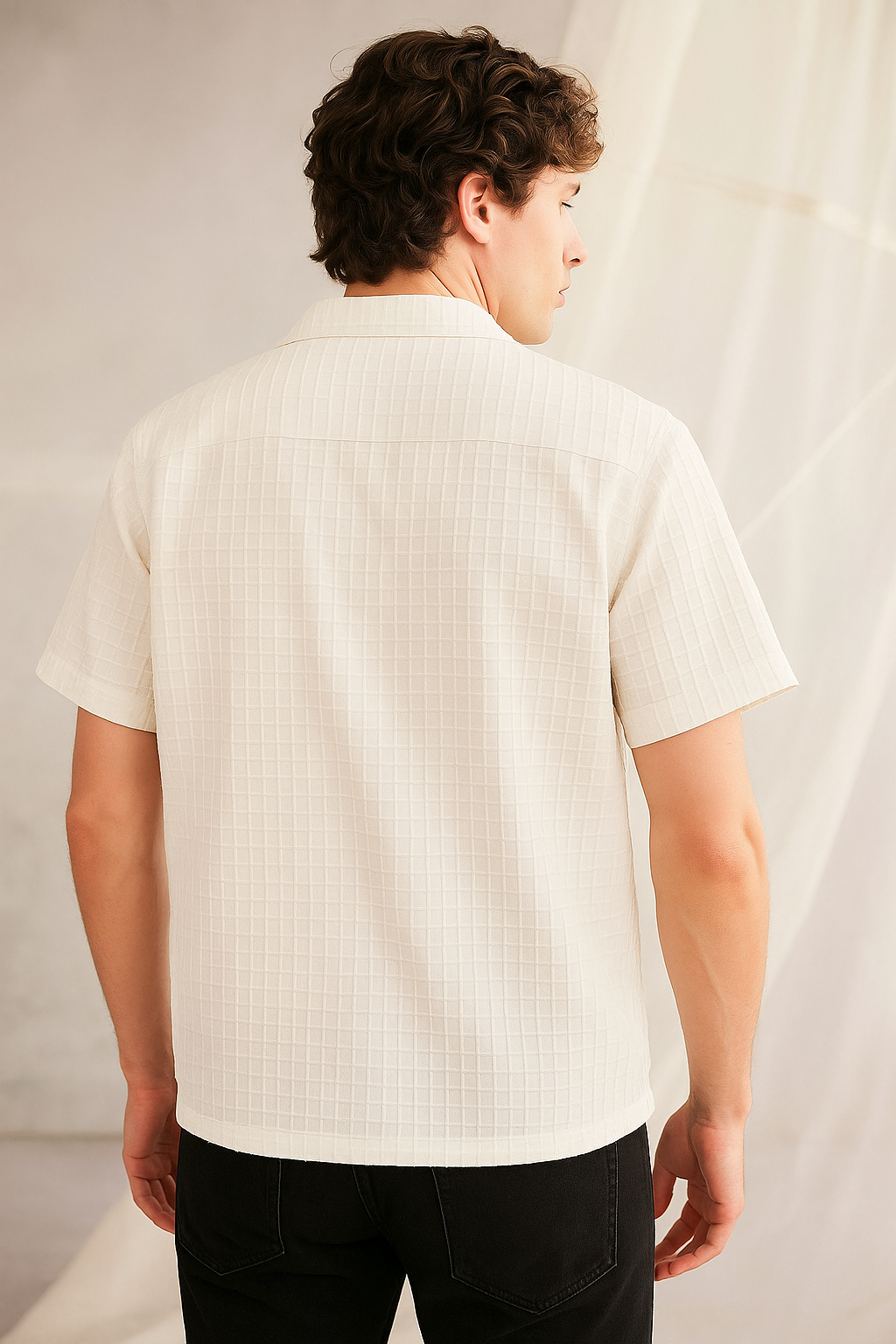 white cotton shirt with Cuban collar and textured weave, IKIMI branding visible, neatly styled for premium summer menswear.